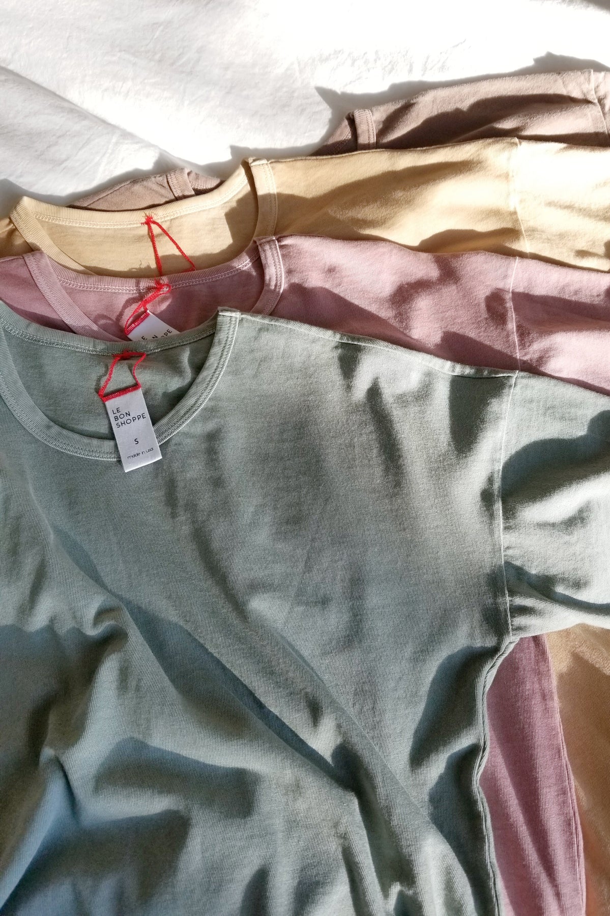 her tee