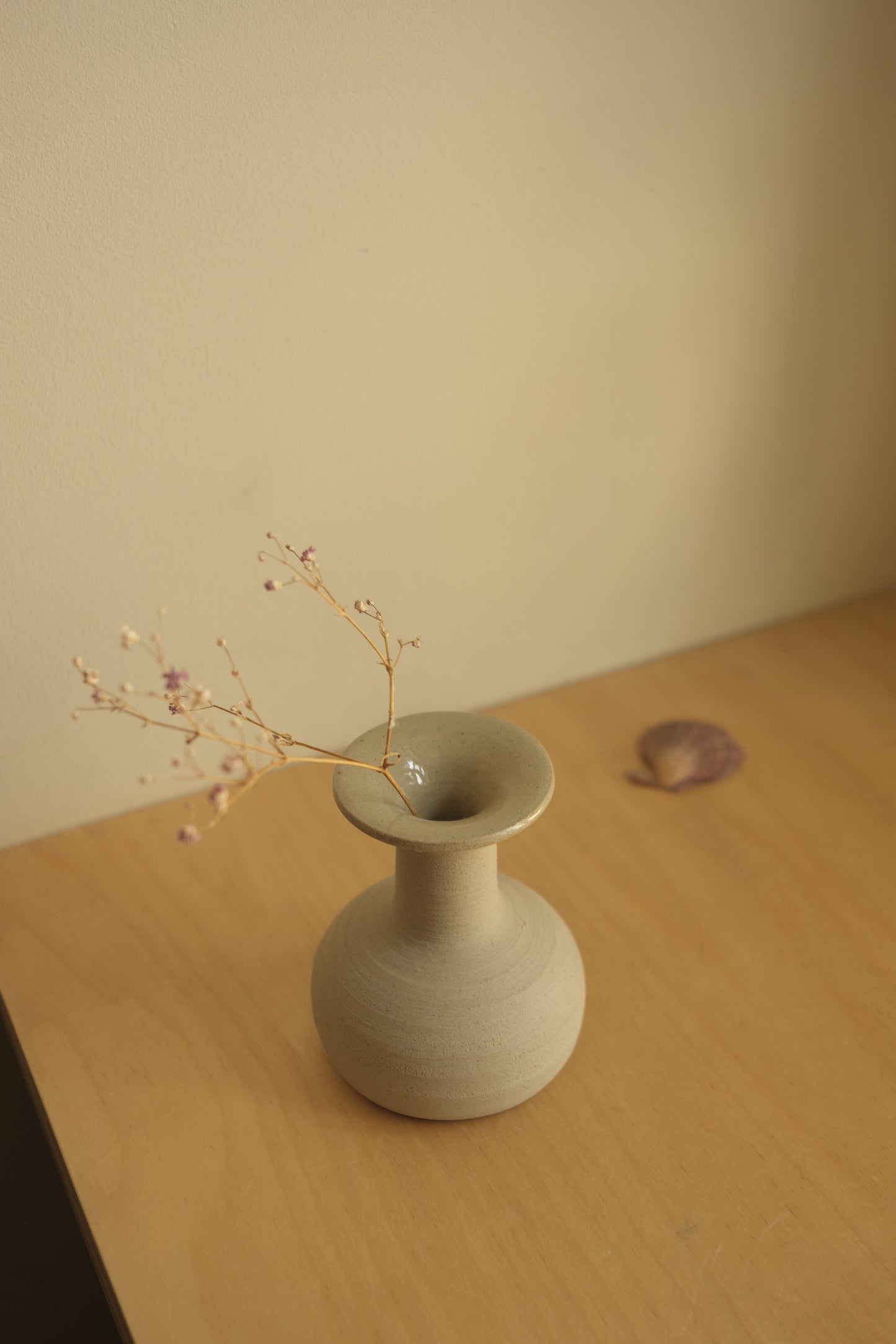 small ceramic vase