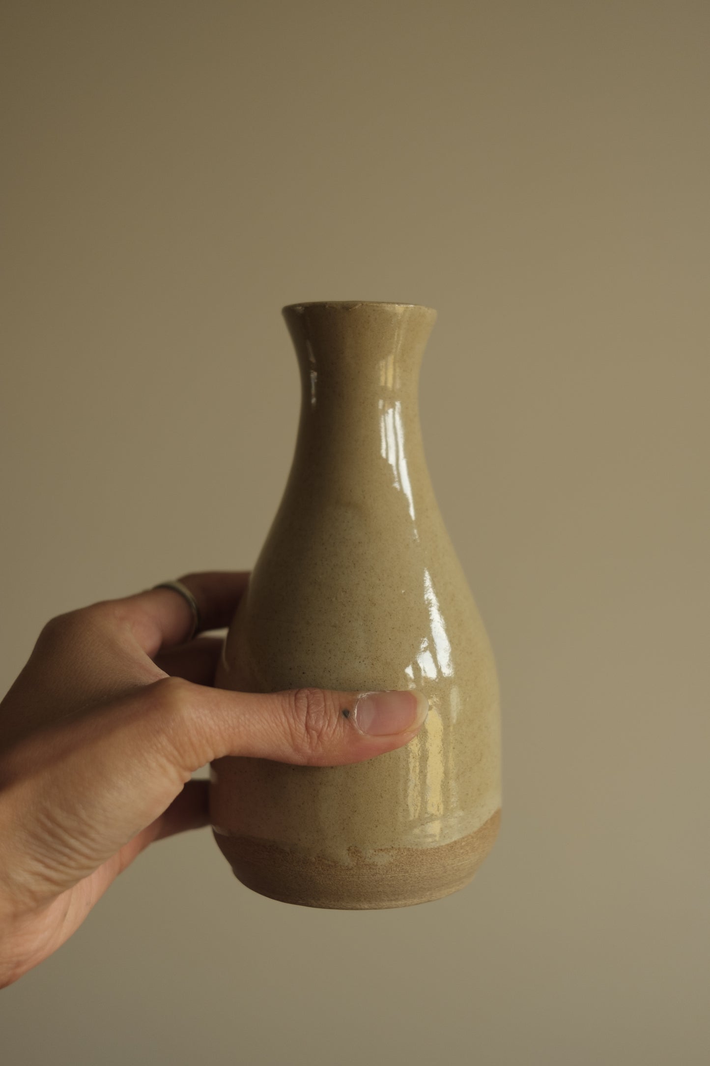 ceramic bottle with foraged stone cork