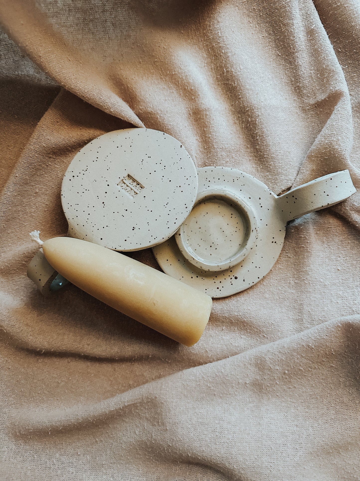 freckled ceramic candle holder with wave
