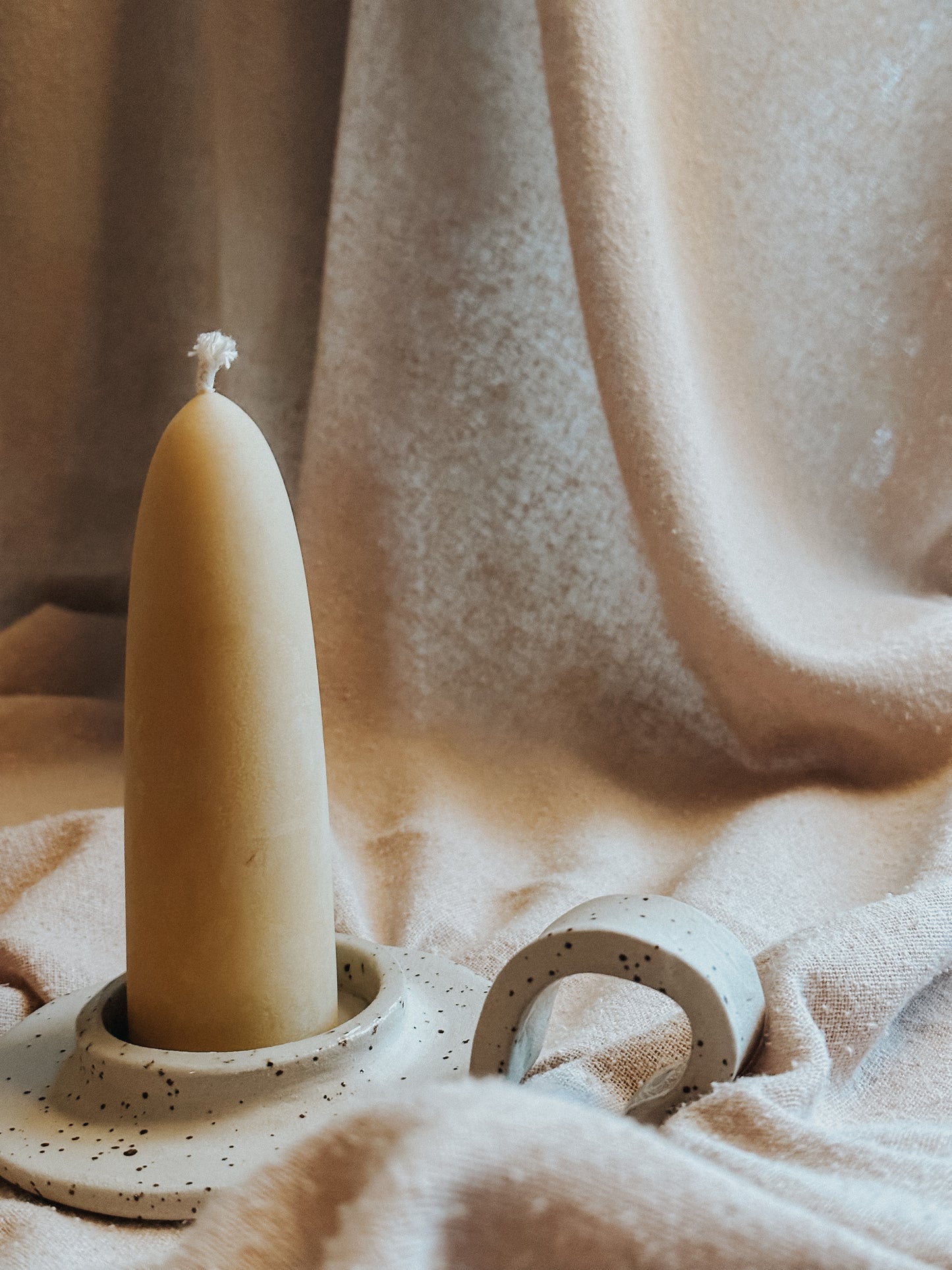 freckled ceramic candle holder with wave