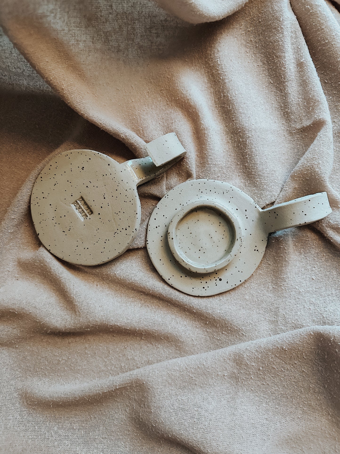 freckled ceramic candle holder with wave