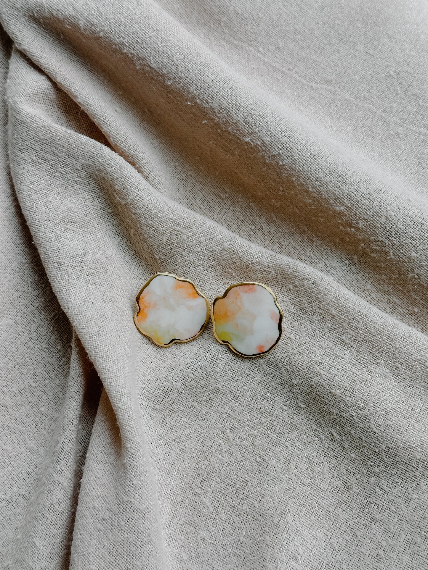 traces of color on cloud porcelain earrings