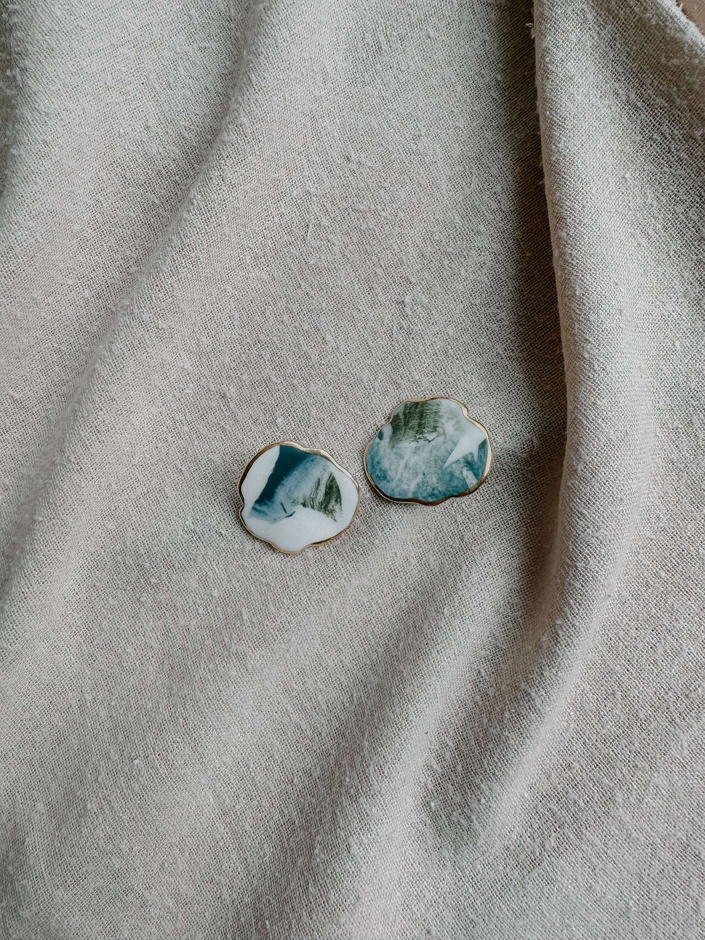 traces of color on cloud porcelain earrings