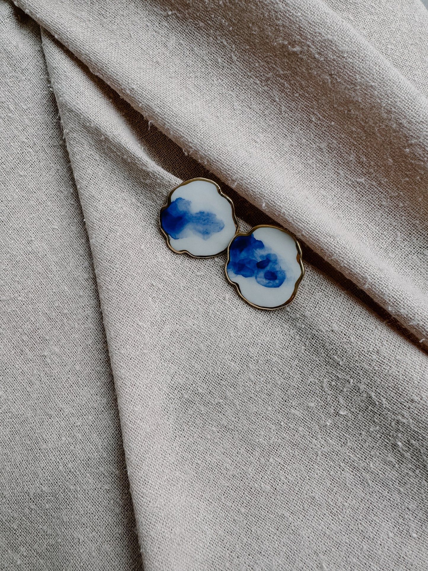 traces of color on cloud porcelain earrings