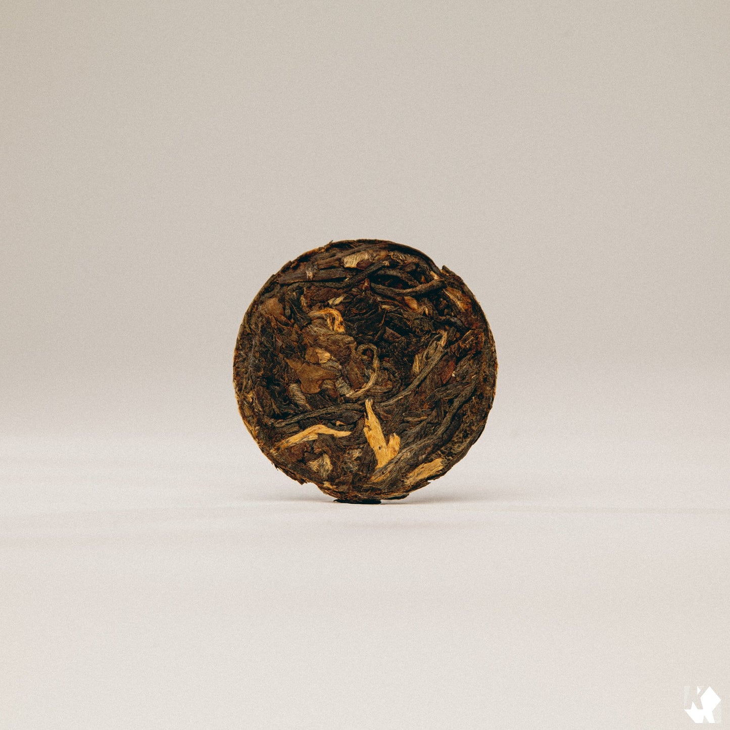 mini black black tea coin