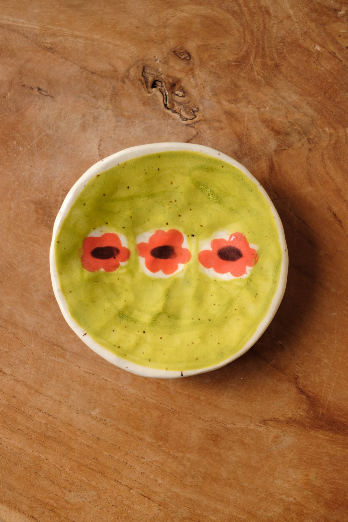 hand-painted poppies in green field tiny plate