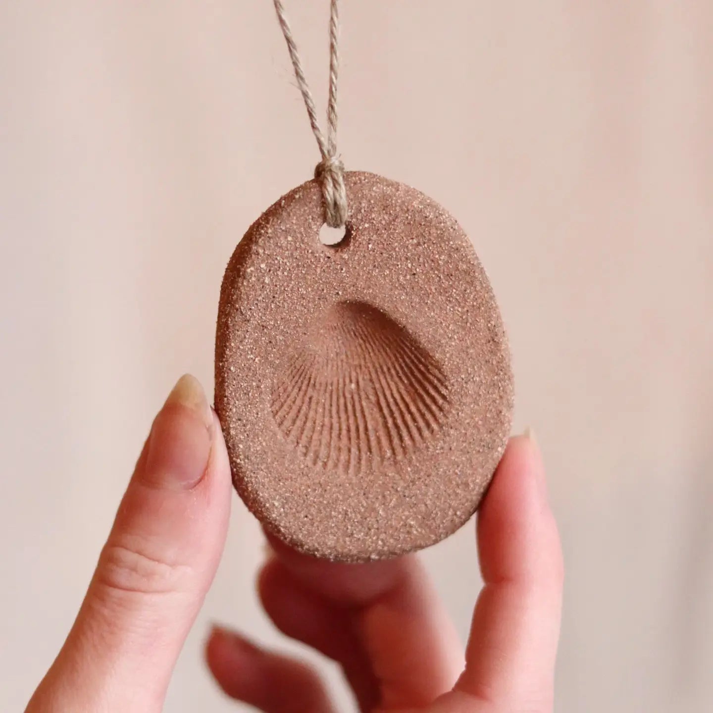 gathered earth ornament with shell no.2