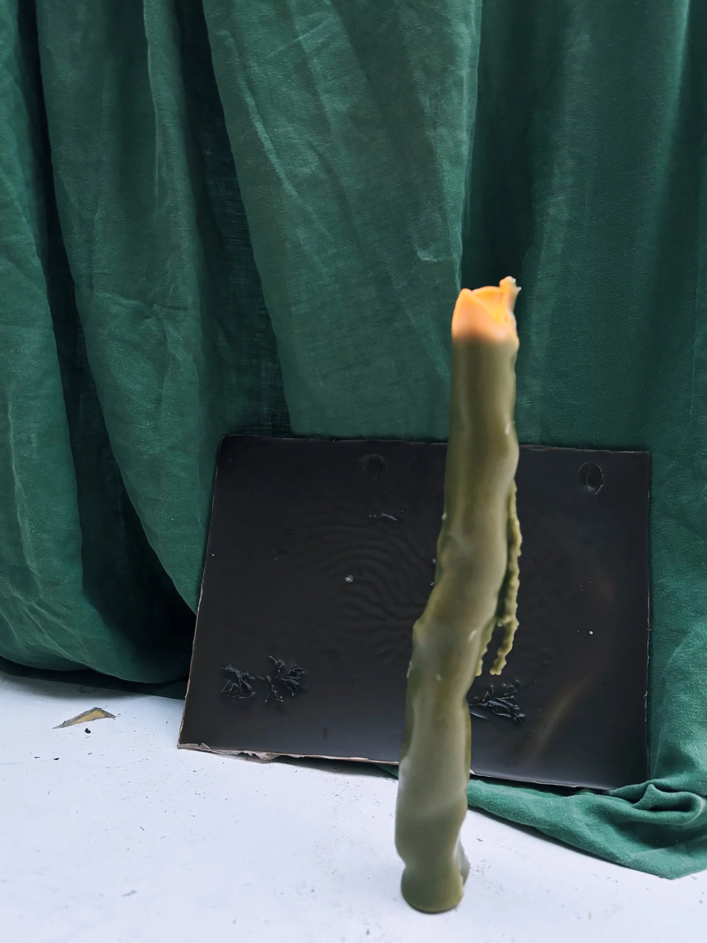 hand-shaped forest candle