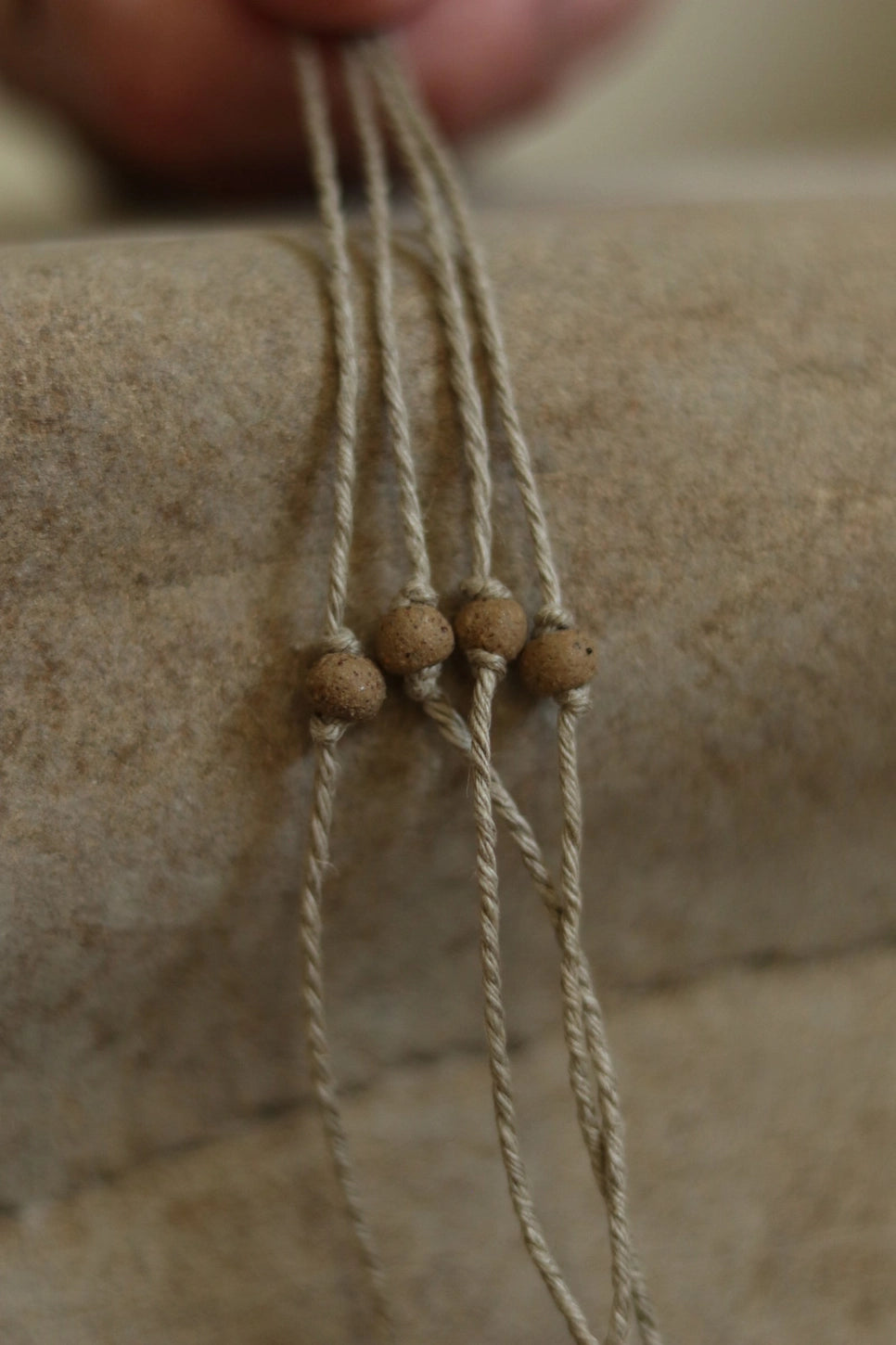 origins clay bead bracelet in gathered earth