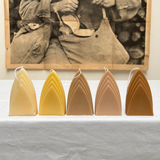 arch candle: earth tones