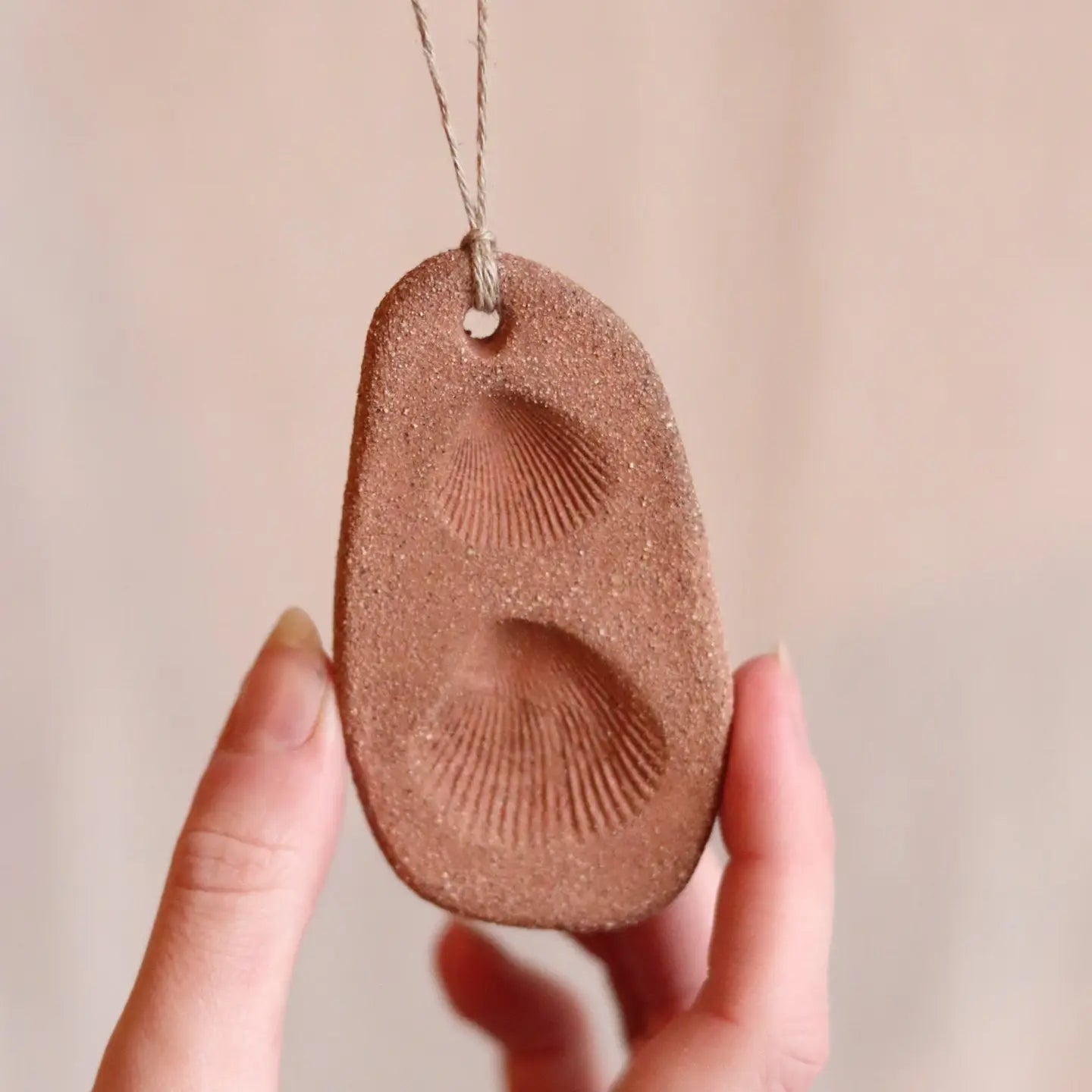 gathered earth ornament with shell no.3