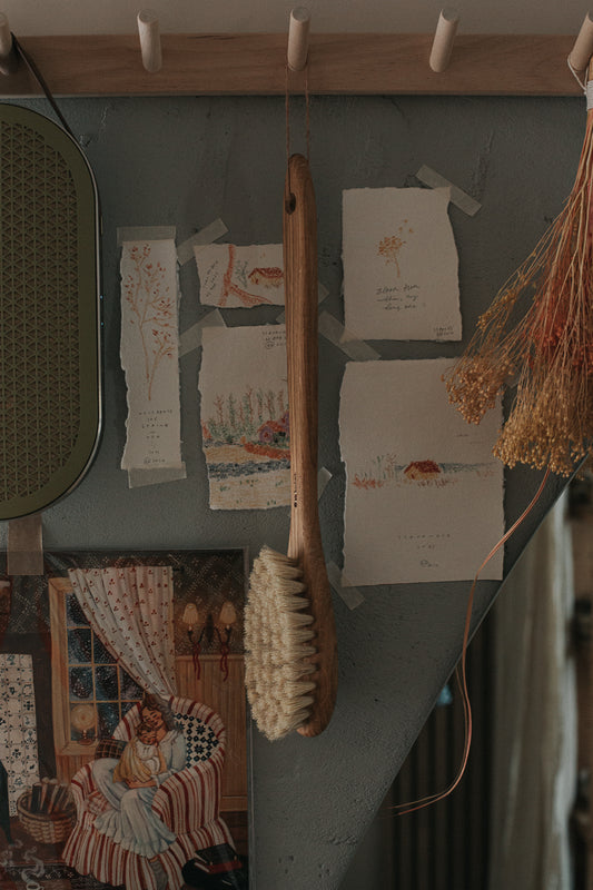 bath brush with long handle in oiled oak wood