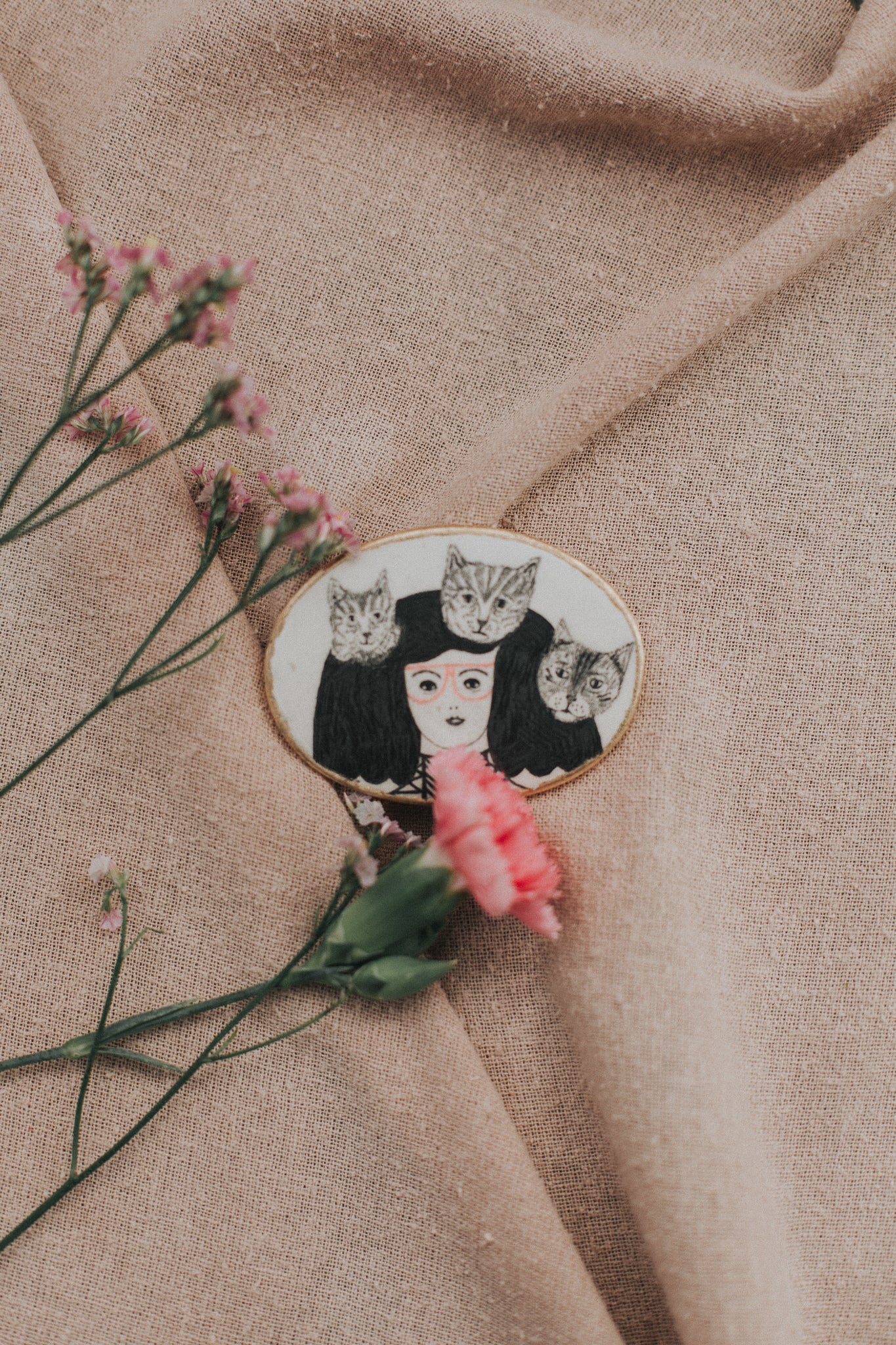 girl with art in hair brooch