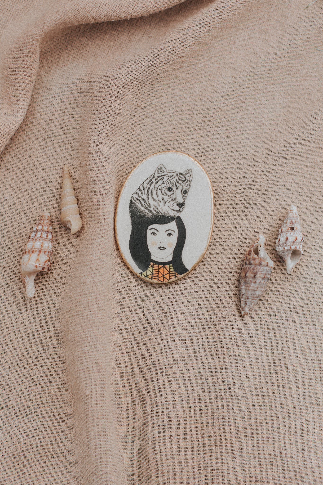 girl with art in hair brooch