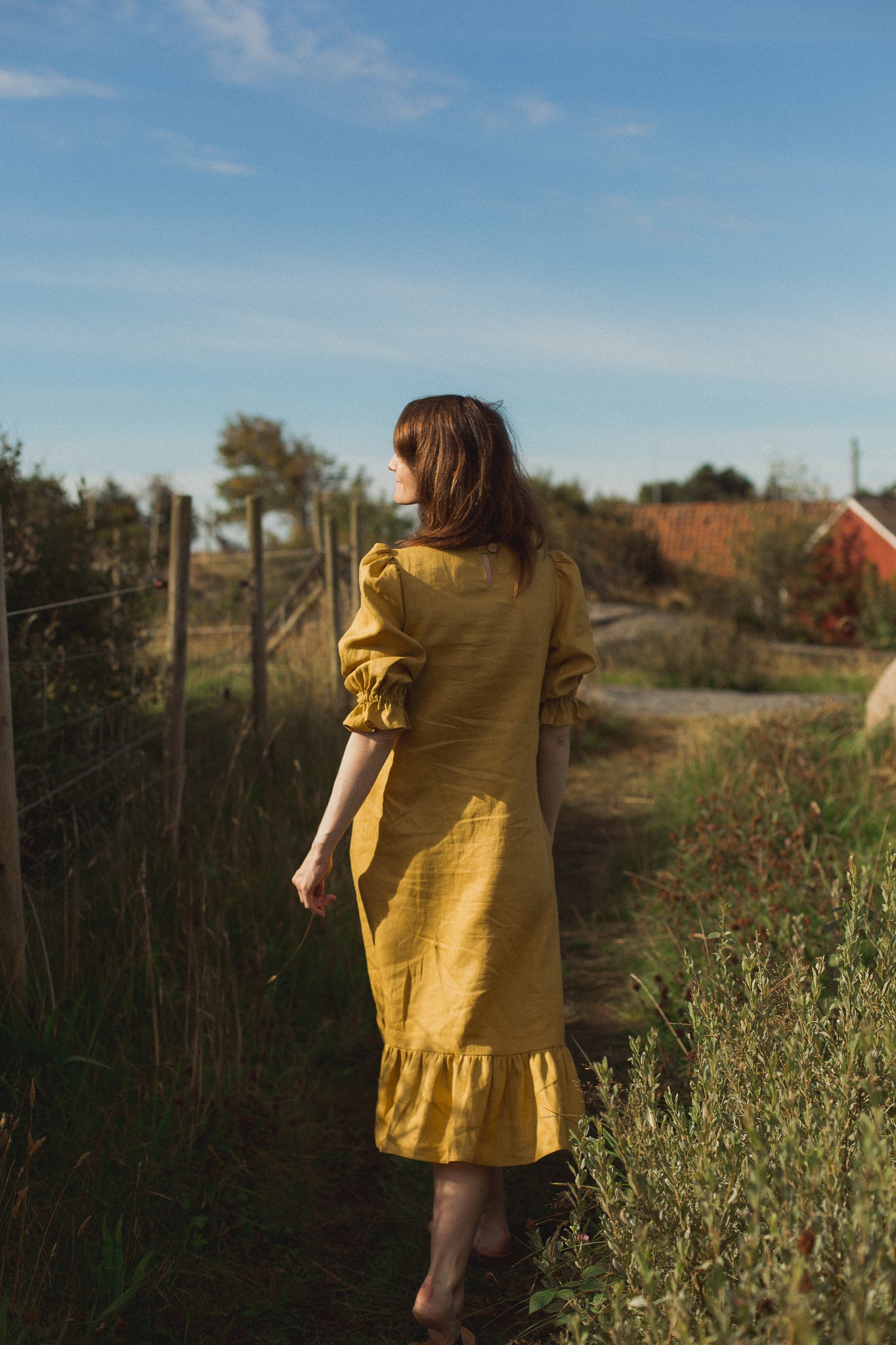 rent the yellow otilia ruffled dress