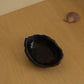uneven medium trinket dish in black clay