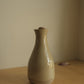 ceramic bottle with foraged stone cork
