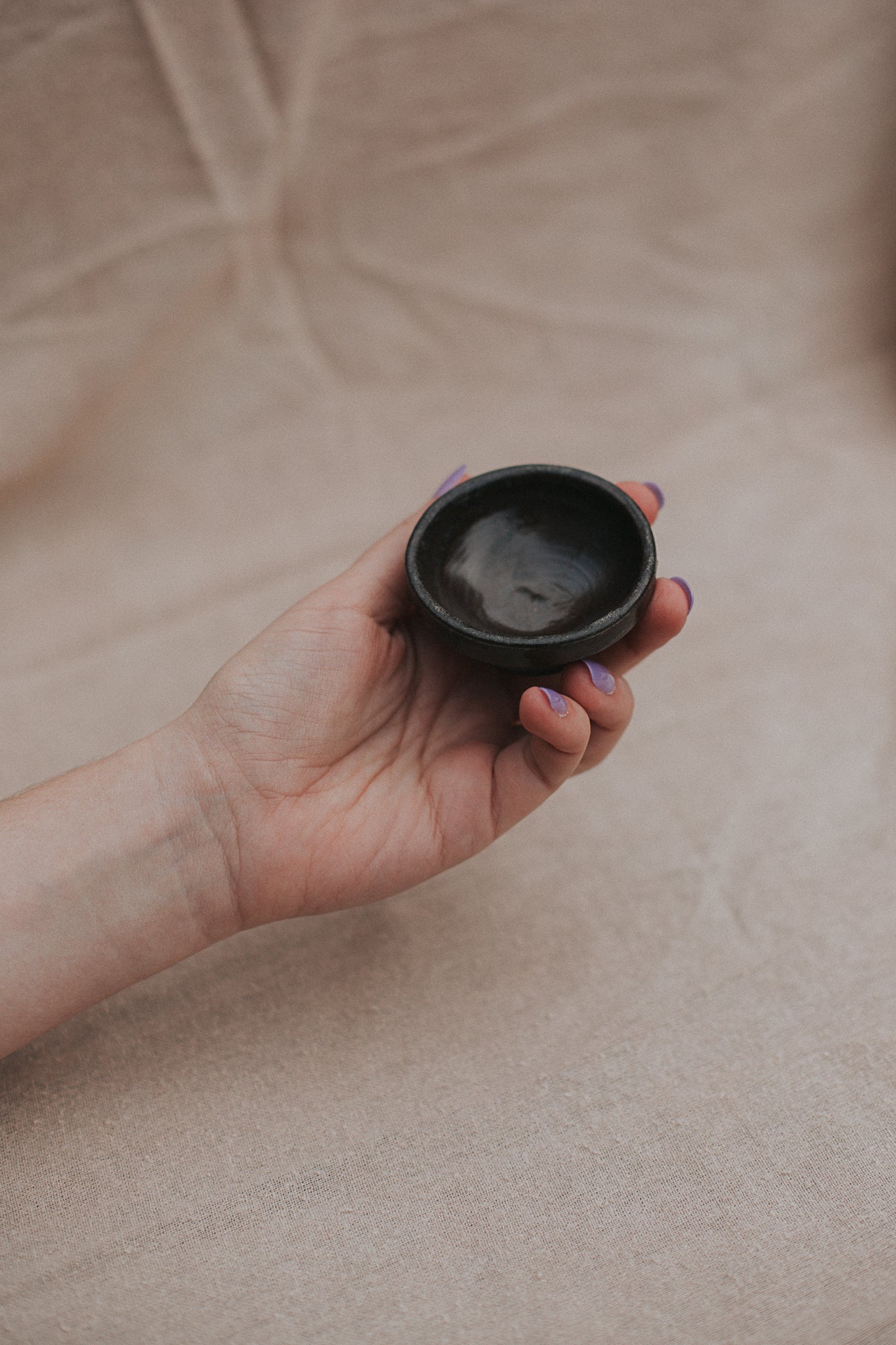 6.5 cm trinket dish in black clay by linda bredenbekk