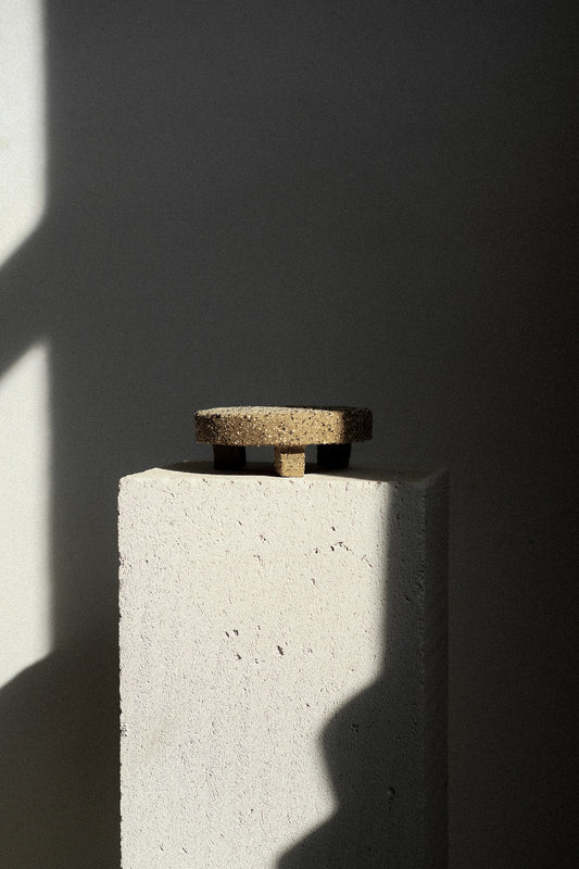 the origen three-legged table pedestal