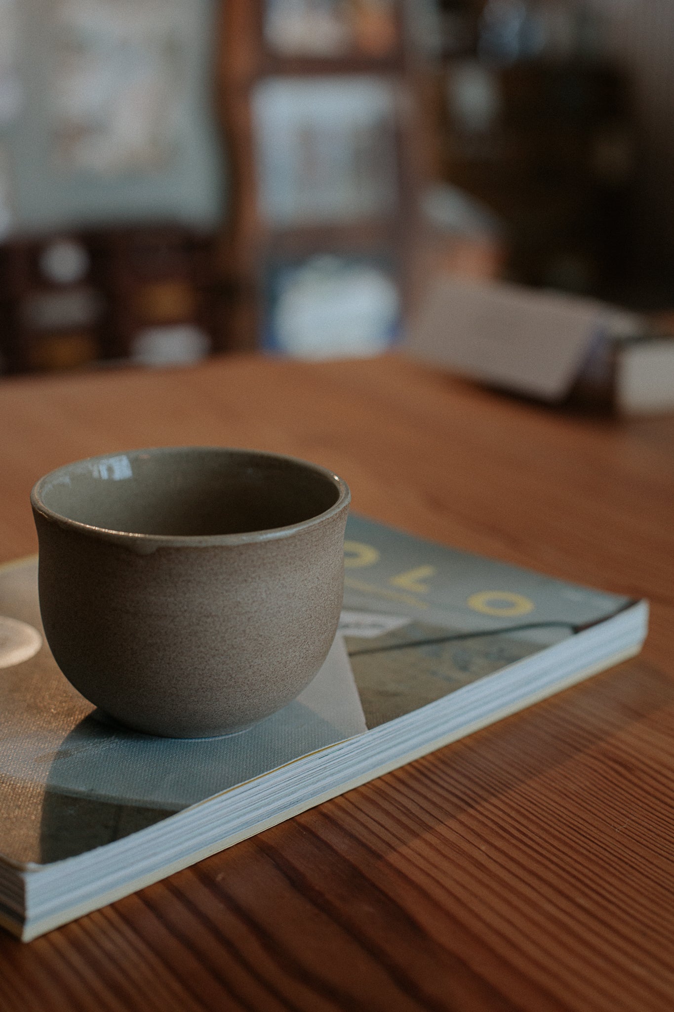 200 ml cup in warm sand by linda bredenbekk