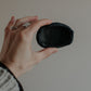 uneven small trinket dish in black clay by linda bredenbekk