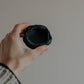 uneven small trinket dish in black clay by linda bredenbekk