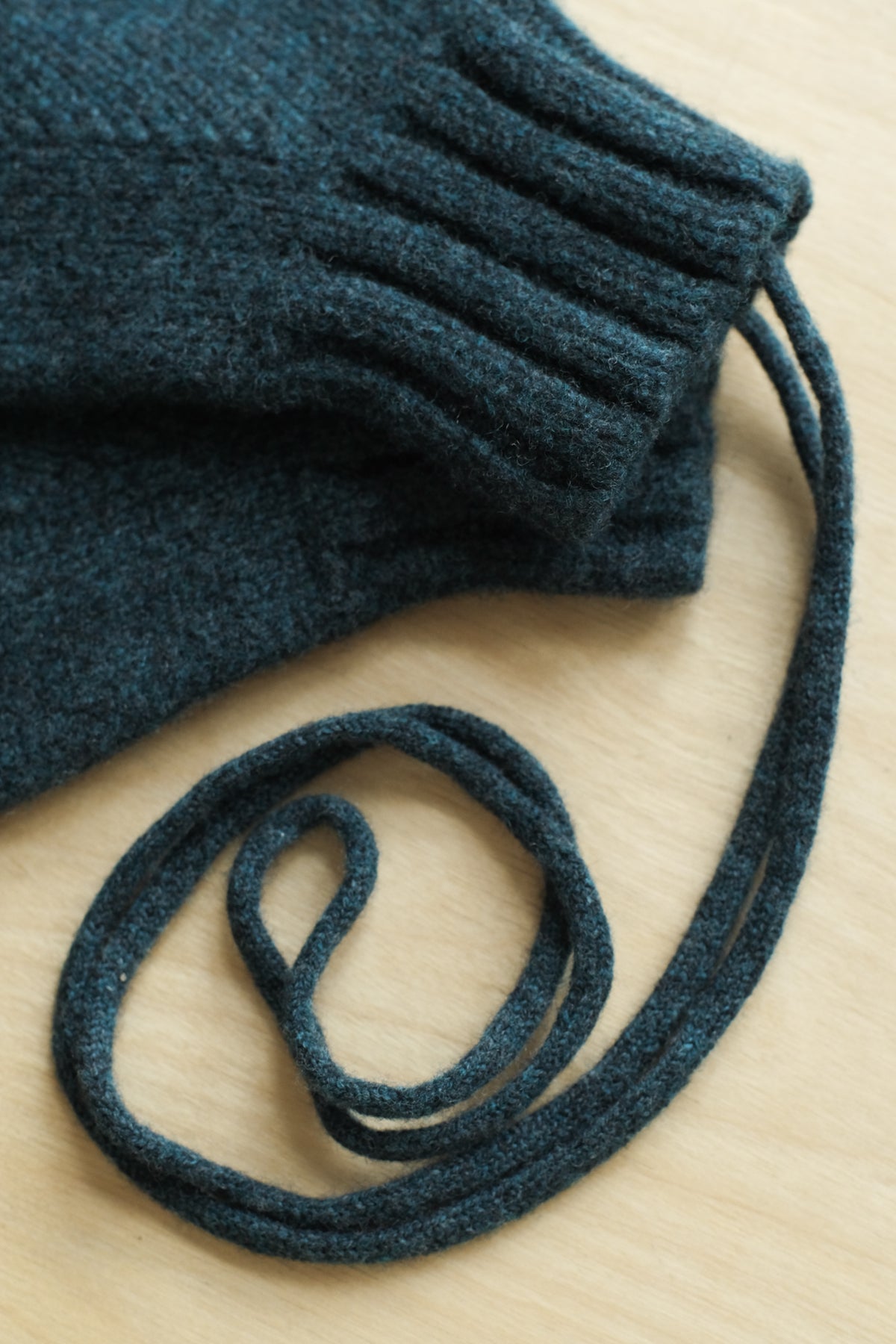 felted lambswool mittens on string