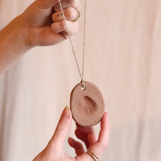 gathered earth ornament with shell no.2