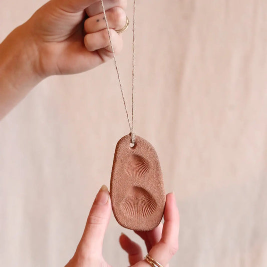 gathered earth ornament with shell no.3