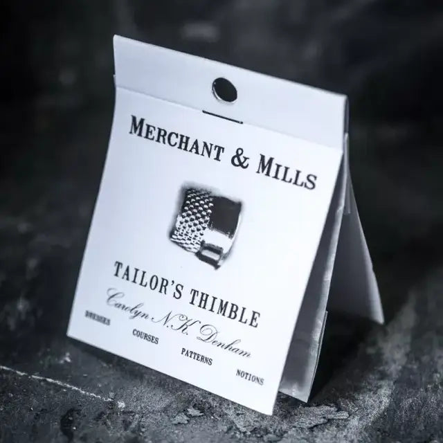 brass tailor's thimble