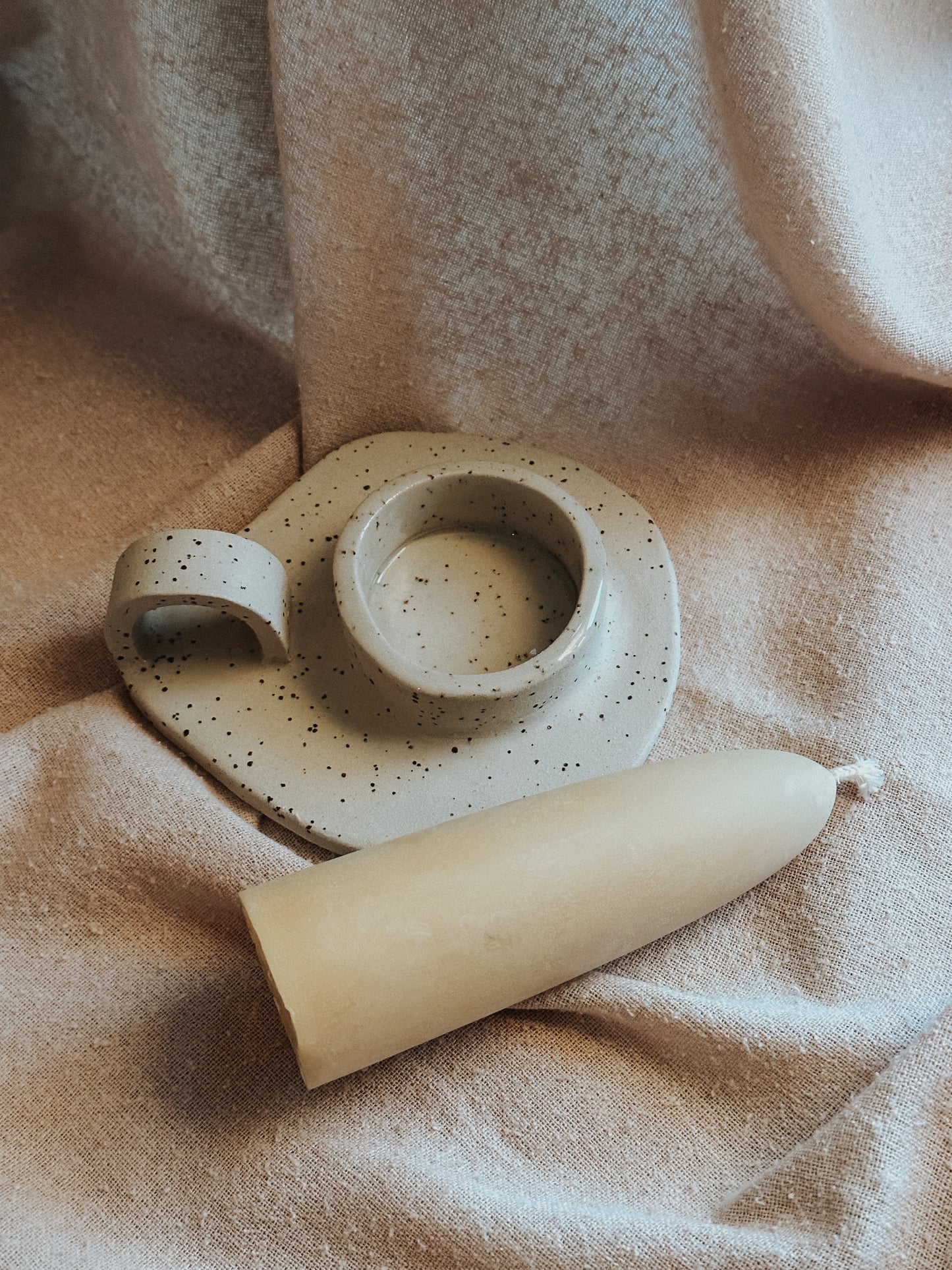 freckled ceramic candle holder with arc