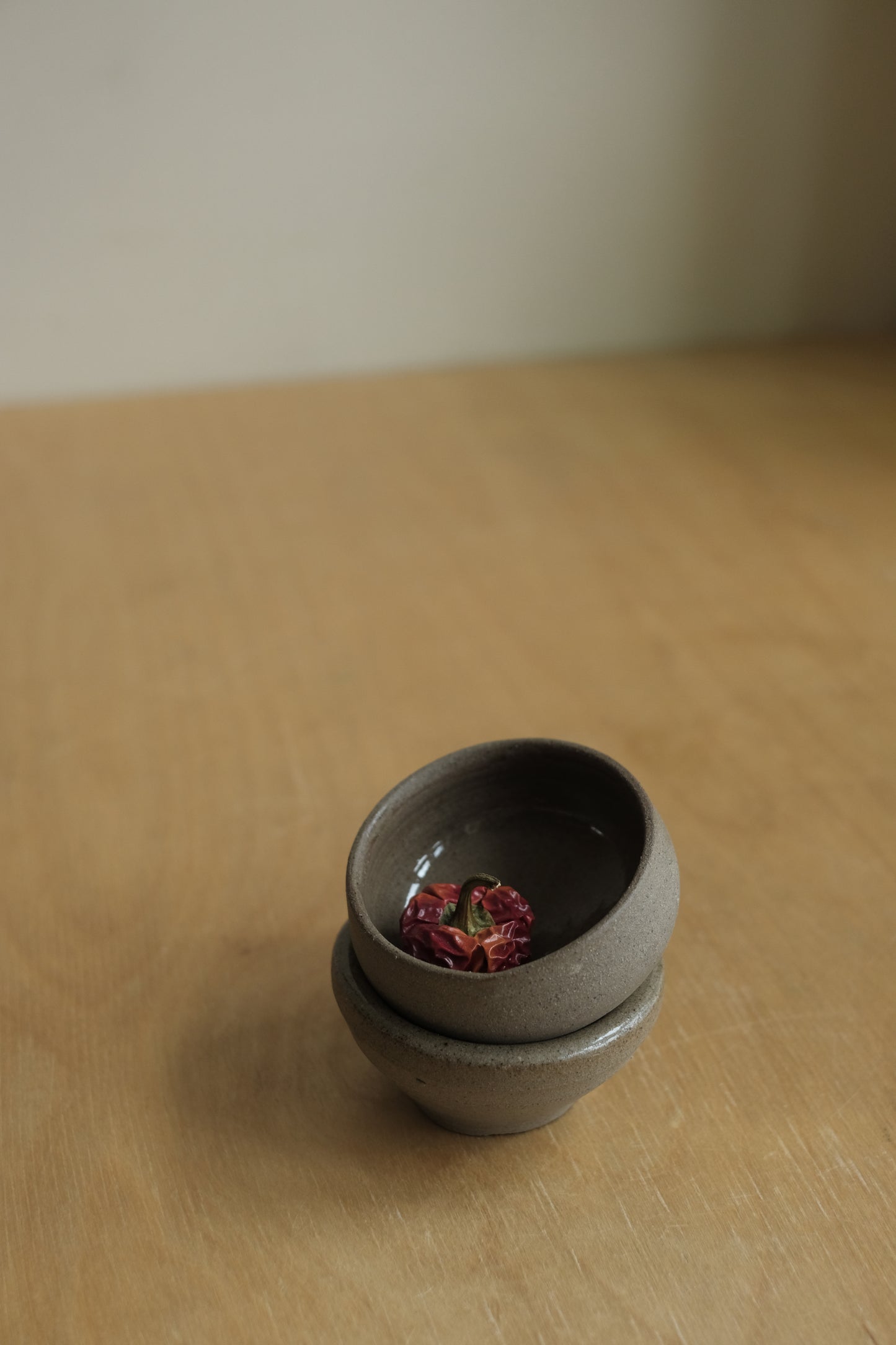 rounded edges trinket dish in warm gray by linda bredenbekk