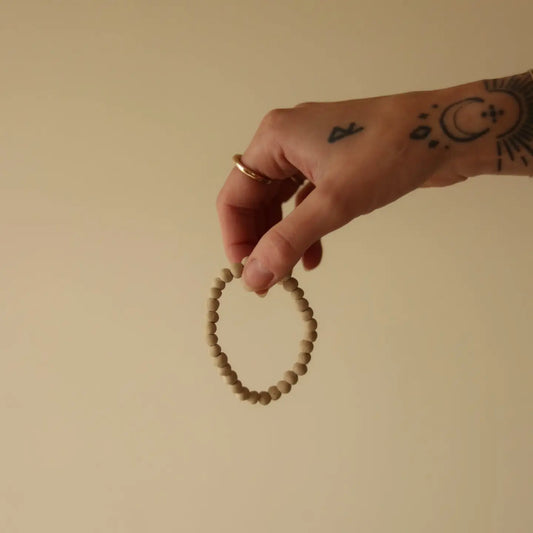 organica clay bead bracelet in ancient bone