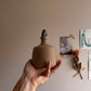 ceramic bottle with foraged stone cork no.2 by linda bredenbekk