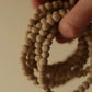 organica clay bead bracelet in ancient bone