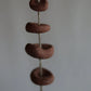 gathered red earth talisman wall hanging