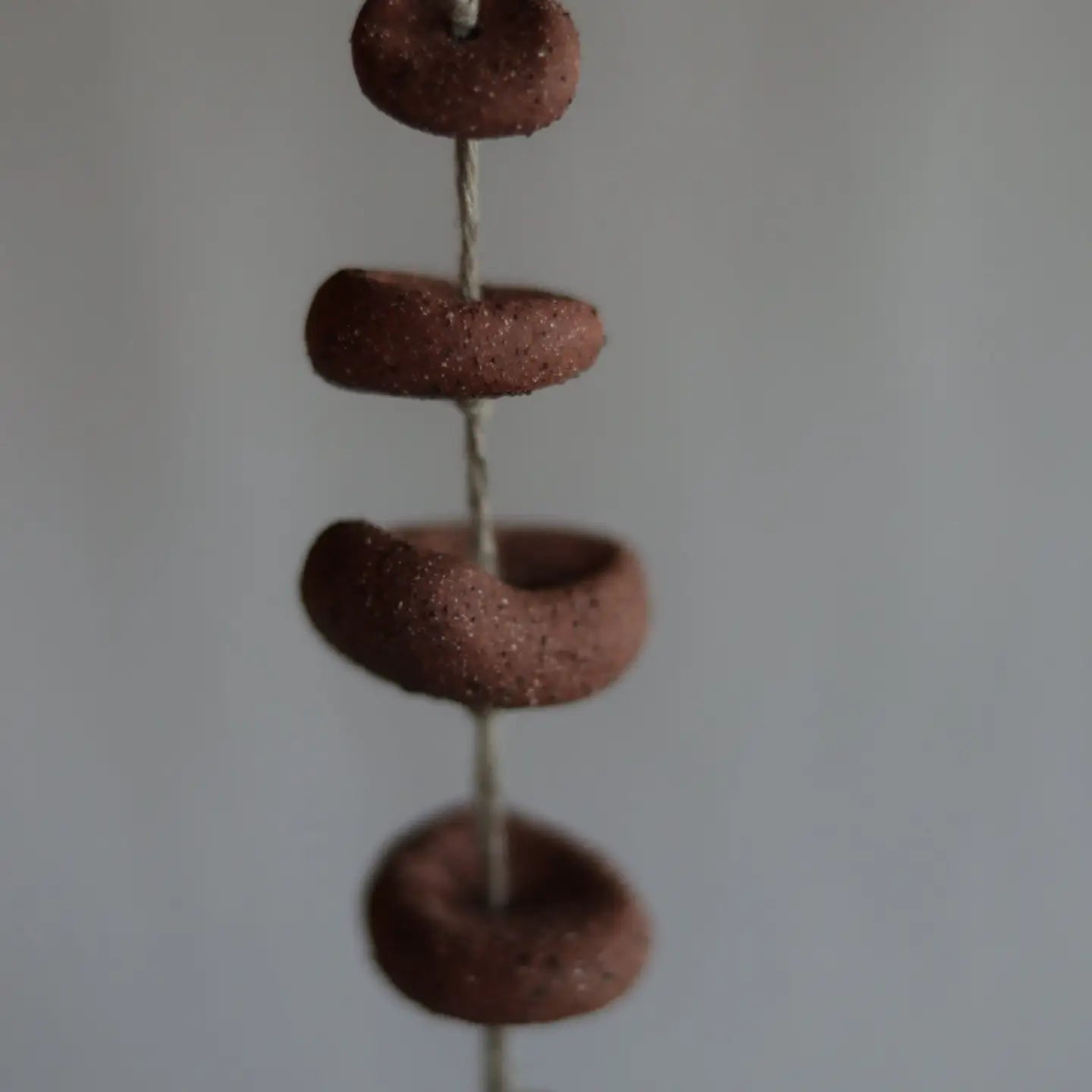 gathered red earth talisman wall hanging
