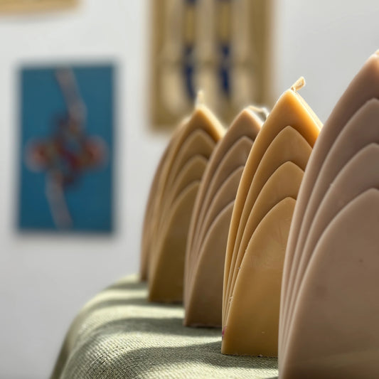 arch candle: earth tones