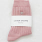 her embroidered socks