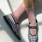 her embroidered socks