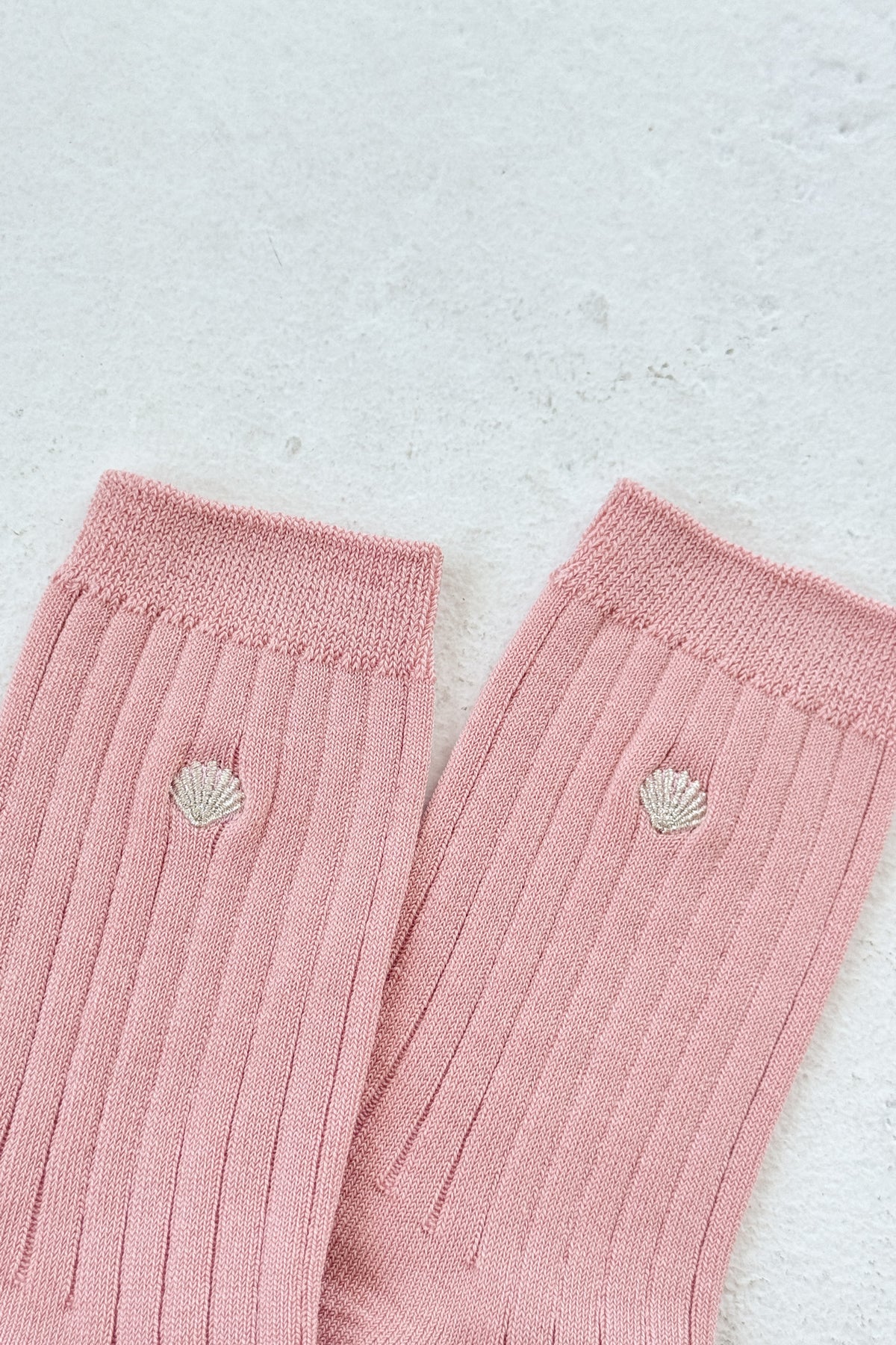 her embroidered socks