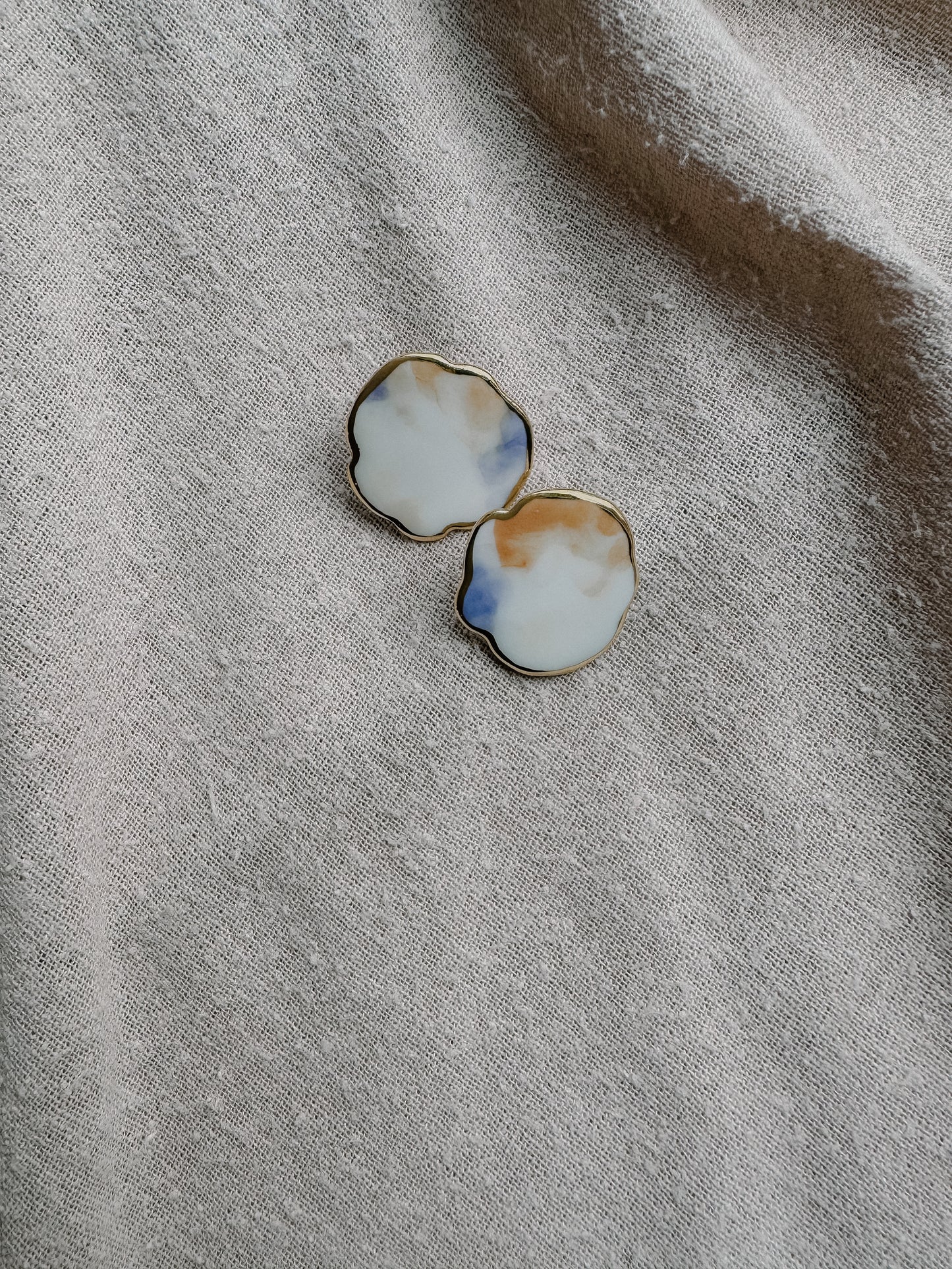 traces of color on cloud porcelain earrings