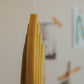 arch candle: olive yellow