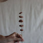 gathered red earth talisman wall hanging