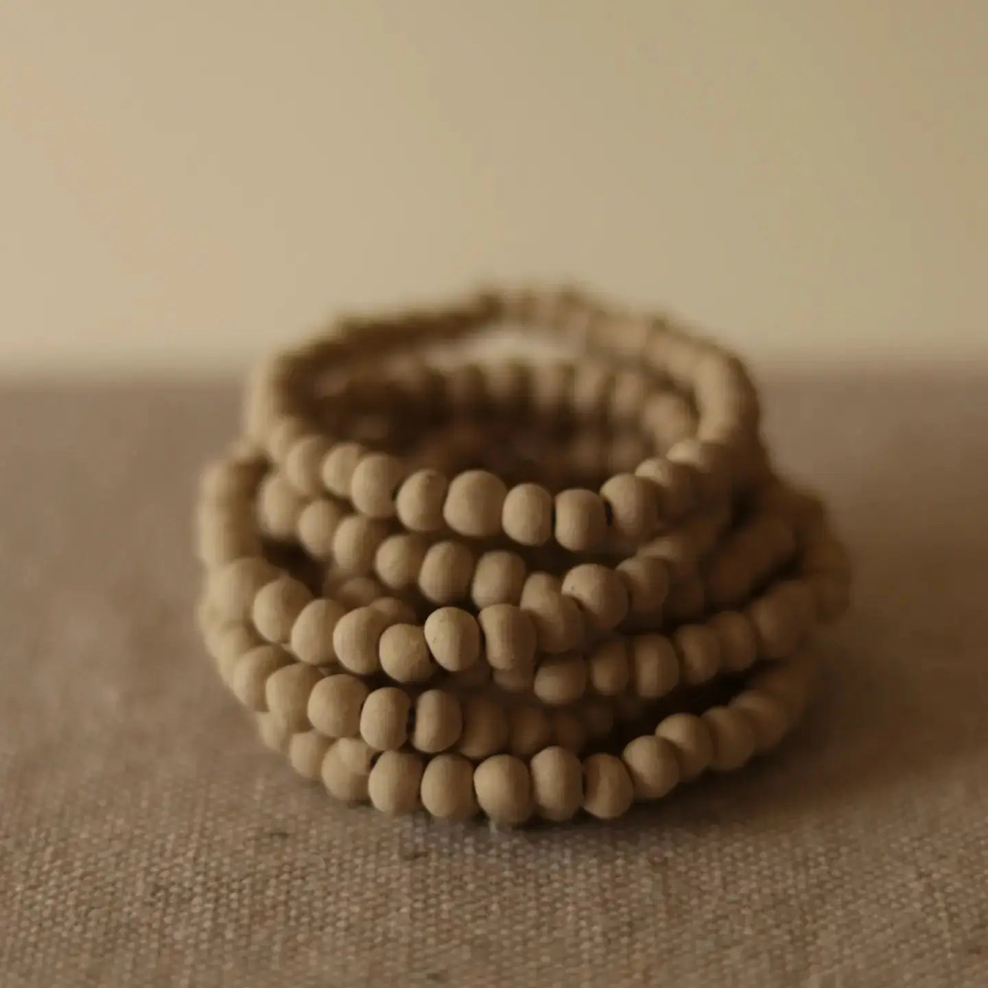 organica clay bead bracelet in ancient bone