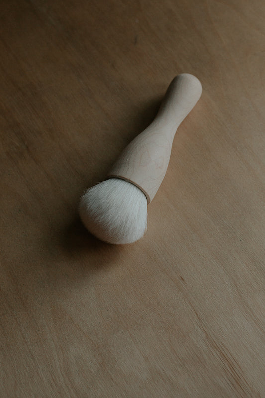 kabuki makeup and hair brush in birch wood